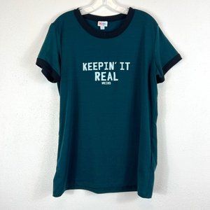 LULAROE TSHIRT SZ LARGE  DARK GREEN AND BLACK  "KEEPIN' IT REAL WEIRD" IN WHITE
